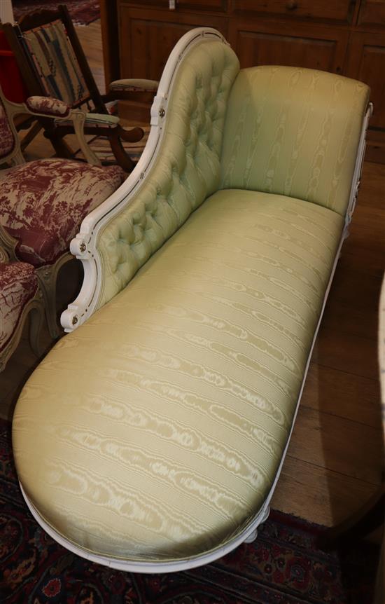 A Victorian white and gilt painted chaise longue